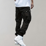 Tomáš – Pánské Cargo Joggingové Kalhoty – Fialové Streetwear Kalhoty s Kapsami na Zip a Náplety