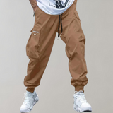 Tomáš – Pánské Cargo Joggingové Kalhoty – Fialové Streetwear Kalhoty s Kapsami na Zip a Náplety